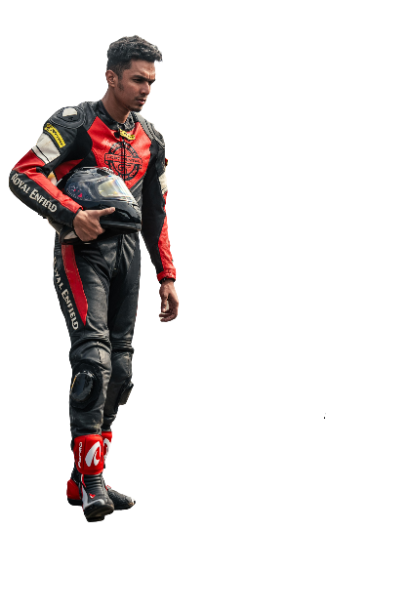 Motorcycle racer in a red and black Royal Enfield racing suit holding a helmet, showcasing a bold and professional riding look, perfect for bike ride training.